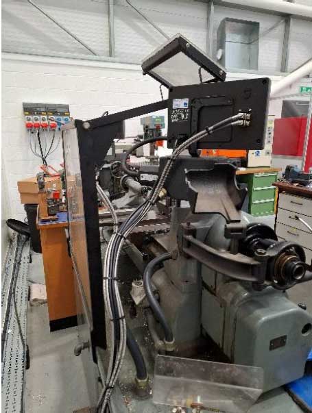 Cable routing on Hardinge lathe to keep them as safe and out the way as possible.